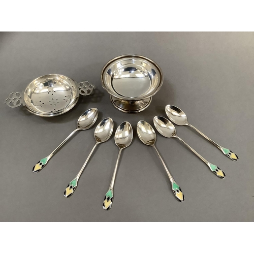 377 - Silver tea strainer and dish stand, Birmingham 1926, 2oz, a set of six silver and enamelled coffee s... 