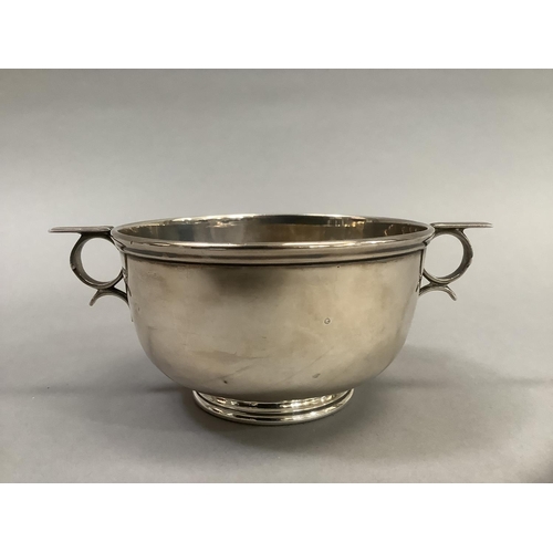 371 - Silver two handled dish on foot rim, 10.75cm diameter, approximate 5oz, Sheffield 1924