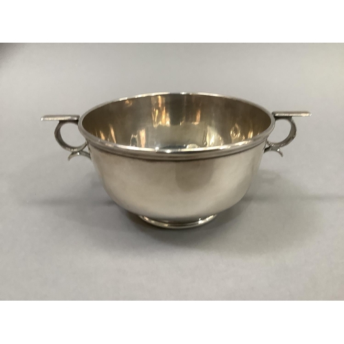 371 - Silver two handled dish on foot rim, 10.75cm diameter, approximate 5oz, Sheffield 1924