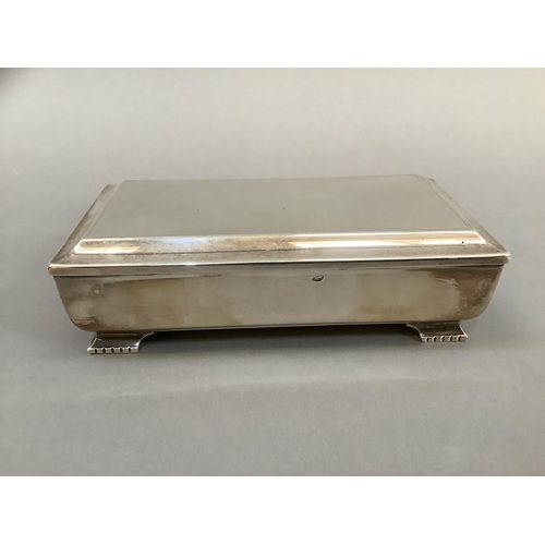 375 - Silver cigarette box on bracket feet, Birmingham 1964