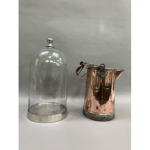 345 - A 19th century copper watering can 35cm high together with a glass dome having metal base and handle... 