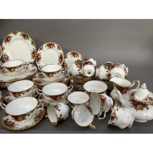 40 - A Royal Albert Old Country Roses tea, coffee and dinner service comprising six teacups and saucers, ... 