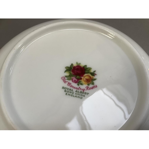 40 - A Royal Albert Old Country Roses tea, coffee and dinner service comprising six teacups and saucers, ... 