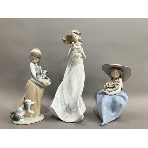 42 - Three Lladro figures, Butterfly Treasures 6777, Girl with her Kittens, Girl with Flowers no.5862 (3)