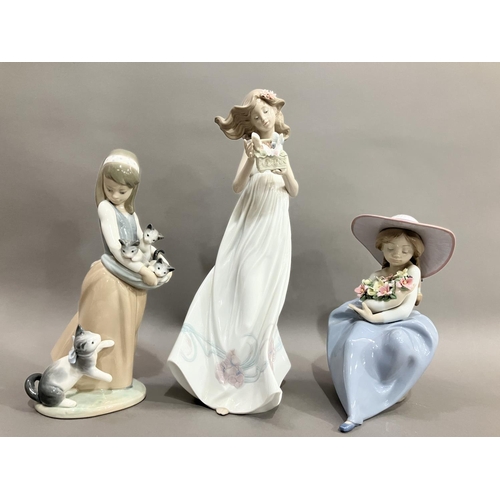 42 - Three Lladro figures, Butterfly Treasures 6777, Girl with her Kittens, Girl with Flowers no.5862 (3)