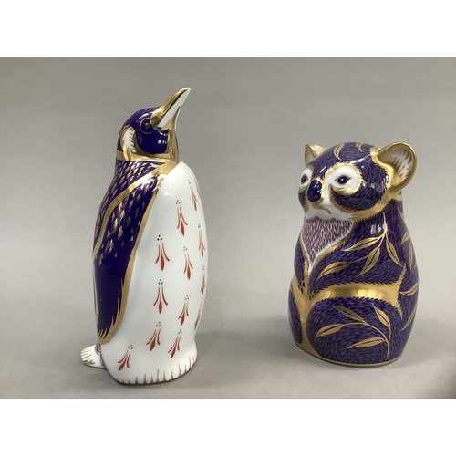 5 - A Royal Crown Derby Koala bear paperweight and a penguin, gold button to one, 11cm and 13.5cm high