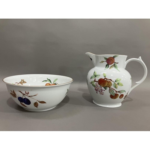 51 - A Royal Worcester Evesham gold toilet jug and bowl