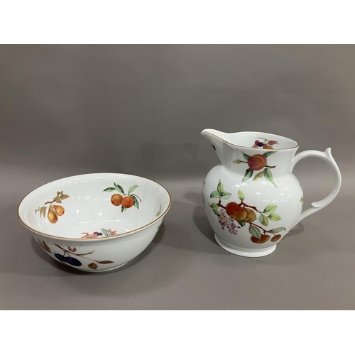 51 - A Royal Worcester Evesham gold toilet jug and bowl