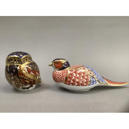 6 - A Royal Crown Derby owl and pheasant paperweight, gold button to one, 8cm and 6.5cm high