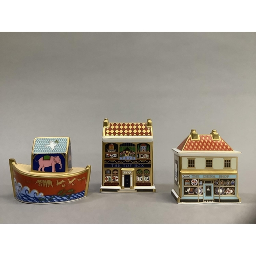 7 - A Royal Crown Derby model 'The China Shop' 8.5cm high, 'The Toy Box' 10cm high and 'Miller's Ark' 8c... 