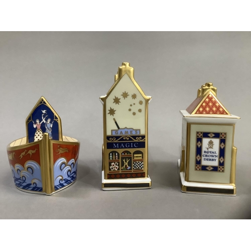 7 - A Royal Crown Derby model 'The China Shop' 8.5cm high, 'The Toy Box' 10cm high and 'Miller's Ark' 8c... 