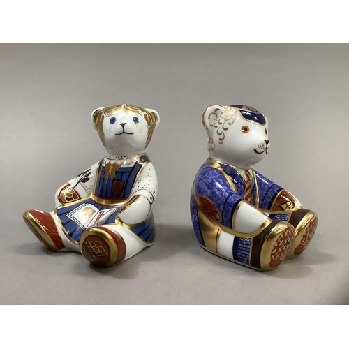 9 - A Royal Crown Derby school girl teddy and school boy teddy, gold buttons, 8.5cm high