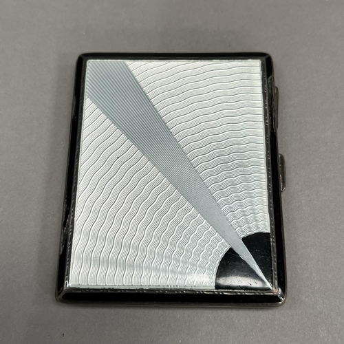 469 - An Art Deco silver and enamel cigarette case, Birmingham 1930 Barker Brothers Silver Ltd, set to the... 