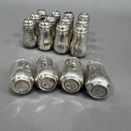 397 - Eight pairs of silver single salt and pepper pots c1950 marked Sterling 7717 with owl stamp to the b... 