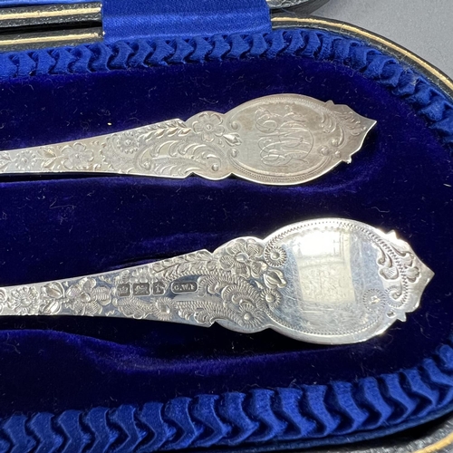 398 - A boxed pair of Edward VII christening spoon and fork, Sheffield 1916 and 1911 from CW Fletcher & So... 