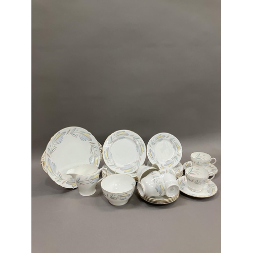 298 - A Shelley Caprice pattern tea service for six comprising cups, saucers, cake plates, tea plates, mil... 