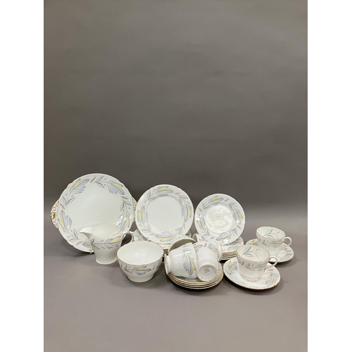 298 - A Shelley Caprice pattern tea service for six comprising cups, saucers, cake plates, tea plates, mil... 