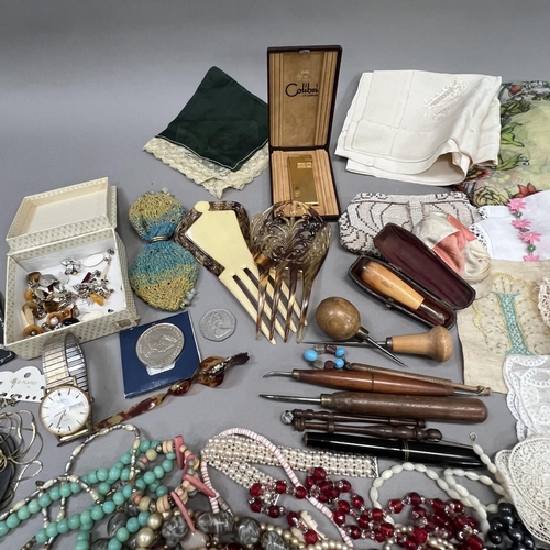 418 - A collection of mid 20th century costume jewellery and early 20th century textiles including necklac... 