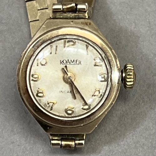 431 - A Roamer lady's manual wrist watch in 9ct gold case on a 9ct gold bracelet, total approximate net we... 