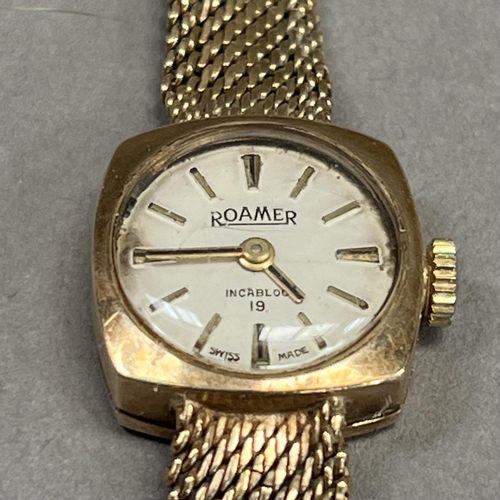 432 - A Roamer lady's manual wrist watch in 9ct gold, cushion case on an integral Milanese bracelet, appro... 