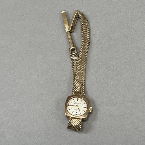 432 - A Roamer lady's manual wrist watch in 9ct gold, cushion case on an integral Milanese bracelet, appro... 