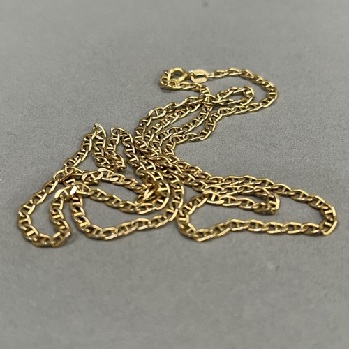 437 - A neck chain in 9ct gold facetted marine curb links, approximate length 64mm, approximate weight 9g