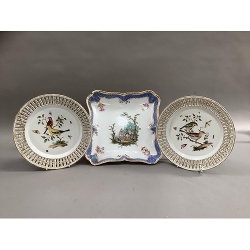 80 - A pair of 19th century Meissen porcelain plates, polychrome painted with birds perched on leafy bran... 