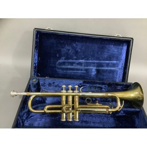 107 - A brass trumpet in fitted case