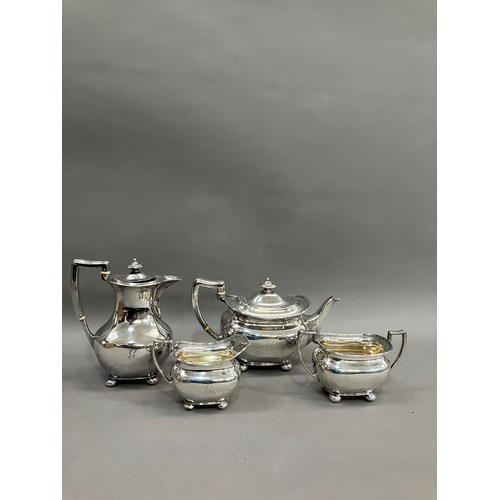 387 - A George V three piece silver tea set, Sheffield 1912 for Atkin Brothers, baluster form with reeded ... 