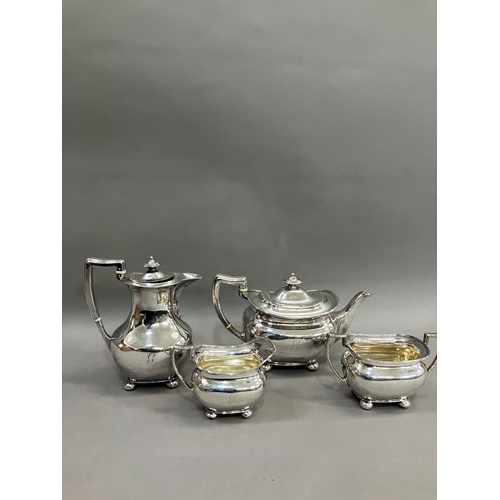 387 - A George V three piece silver tea set, Sheffield 1912 for Atkin Brothers, baluster form with reeded ... 