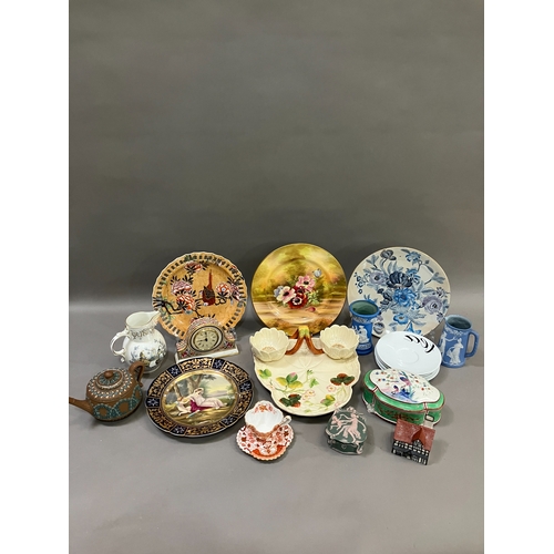 305 - A collection of ceramics comprising a moulded hors d'oeuvres tray formed as a basket with lilies, a ... 