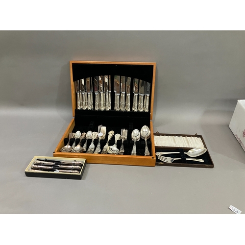 310 - A suite of king's pattern cutlery for twelve in fitted case together with cased knife and fish serve... 