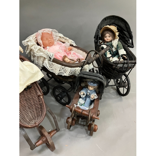 355 - Three Victorian style prams of graduated size together with a Victorian style child's open chair and... 