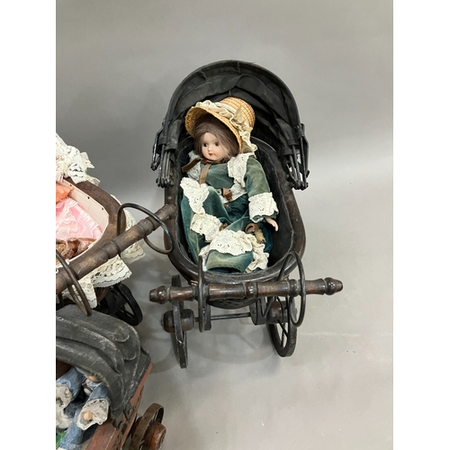 355 - Three Victorian style prams of graduated size together with a Victorian style child's open chair and... 