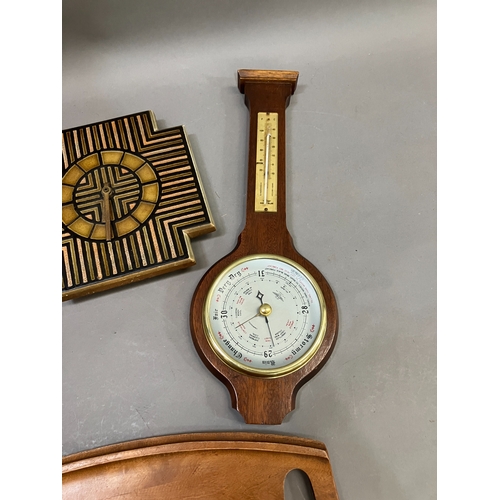 332 - A copper and oak galleried tray, mahogany wall clock, an oak barometer (at fault), a tile wall clock... 