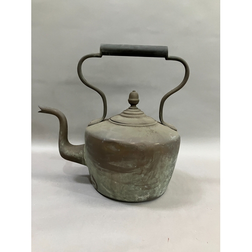 313 - A large copper kettle, 40cm over handle