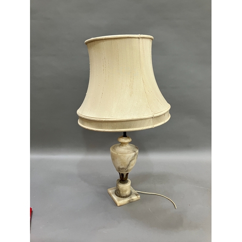 328 - A gilt metal mounted alabaster table lamp of urn form on a square base, complete with shade, 42.5cm ... 