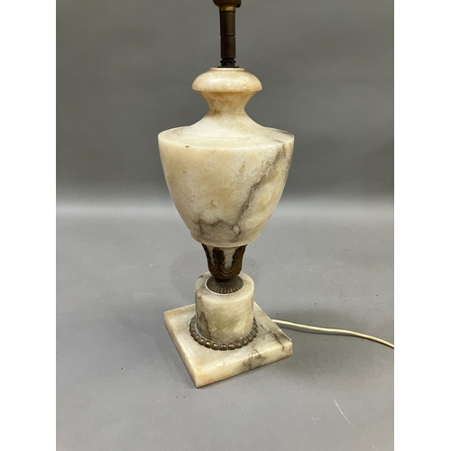 328 - A gilt metal mounted alabaster table lamp of urn form on a square base, complete with shade, 42.5cm ... 