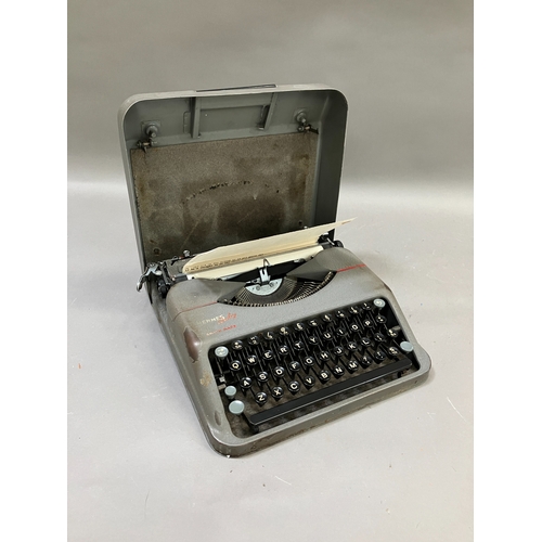 315 - A vintage Hermes portable typewriter in carry case