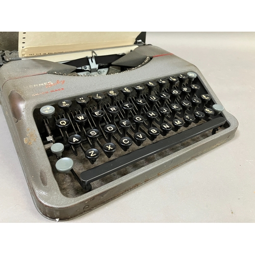 315 - A vintage Hermes portable typewriter in carry case