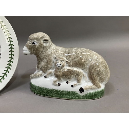 74 - A Rye pottery 2007 group of ewe and lamb, 14.5cm high together with Portmeirion plate, rose decorate... 