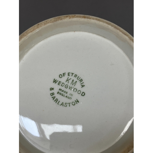 84 - A Keith Murray for Wedgwood celadon green and cream vase of slightly tapered cylindrical form incise... 