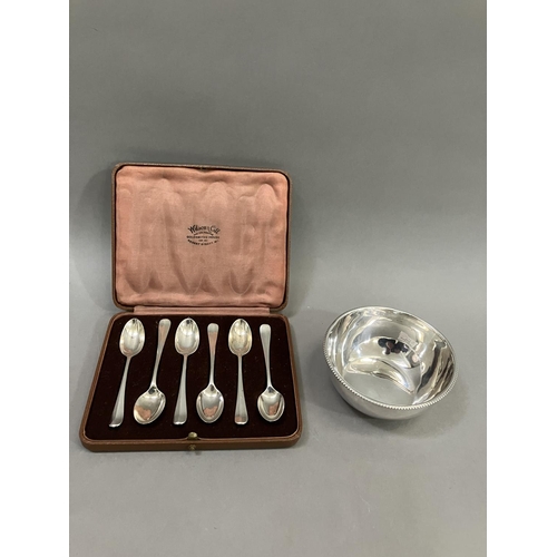 366 - A box set of six Edward VIII silver coffee spoons, Sheffield 1936, rat tail pattern, together with a... 