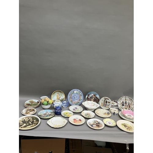 109 - A collection of commemorative and decorative plates including a moulded wall plaque, Ringtons jar an... 