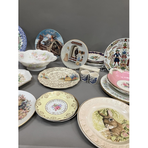 109 - A collection of commemorative and decorative plates including a moulded wall plaque, Ringtons jar an... 