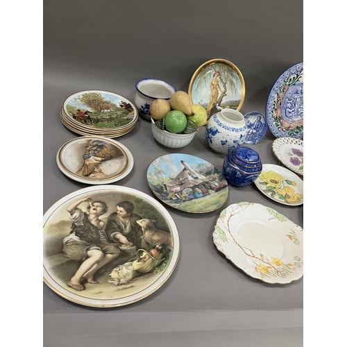 109 - A collection of commemorative and decorative plates including a moulded wall plaque, Ringtons jar an... 