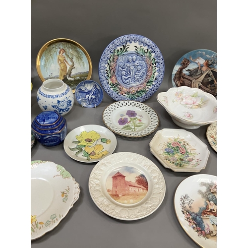 109 - A collection of commemorative and decorative plates including a moulded wall plaque, Ringtons jar an... 