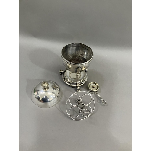 409 - An Edwardian silver plated egg coddler with spirit stand