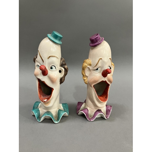 56 - A pair of ceramic clowns heads on ruffled collars with gaping mouths, 15cm high