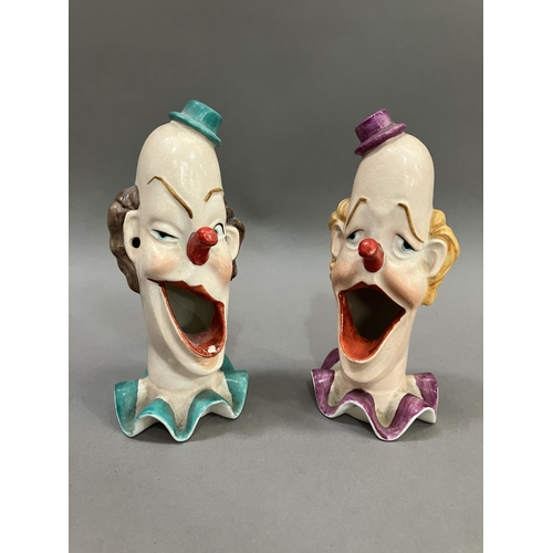 56 - A pair of ceramic clowns heads on ruffled collars with gaping mouths, 15cm high